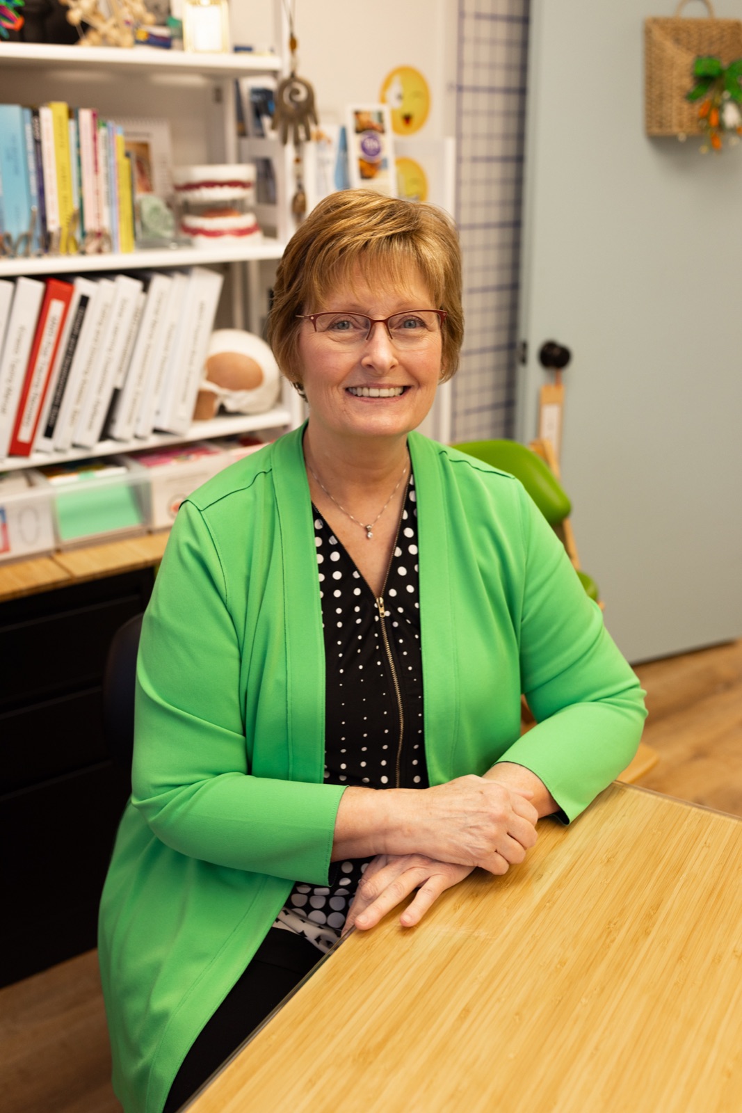 Kathleen M. Elder, RDH (Retired), COM, at the Digits & Spots office