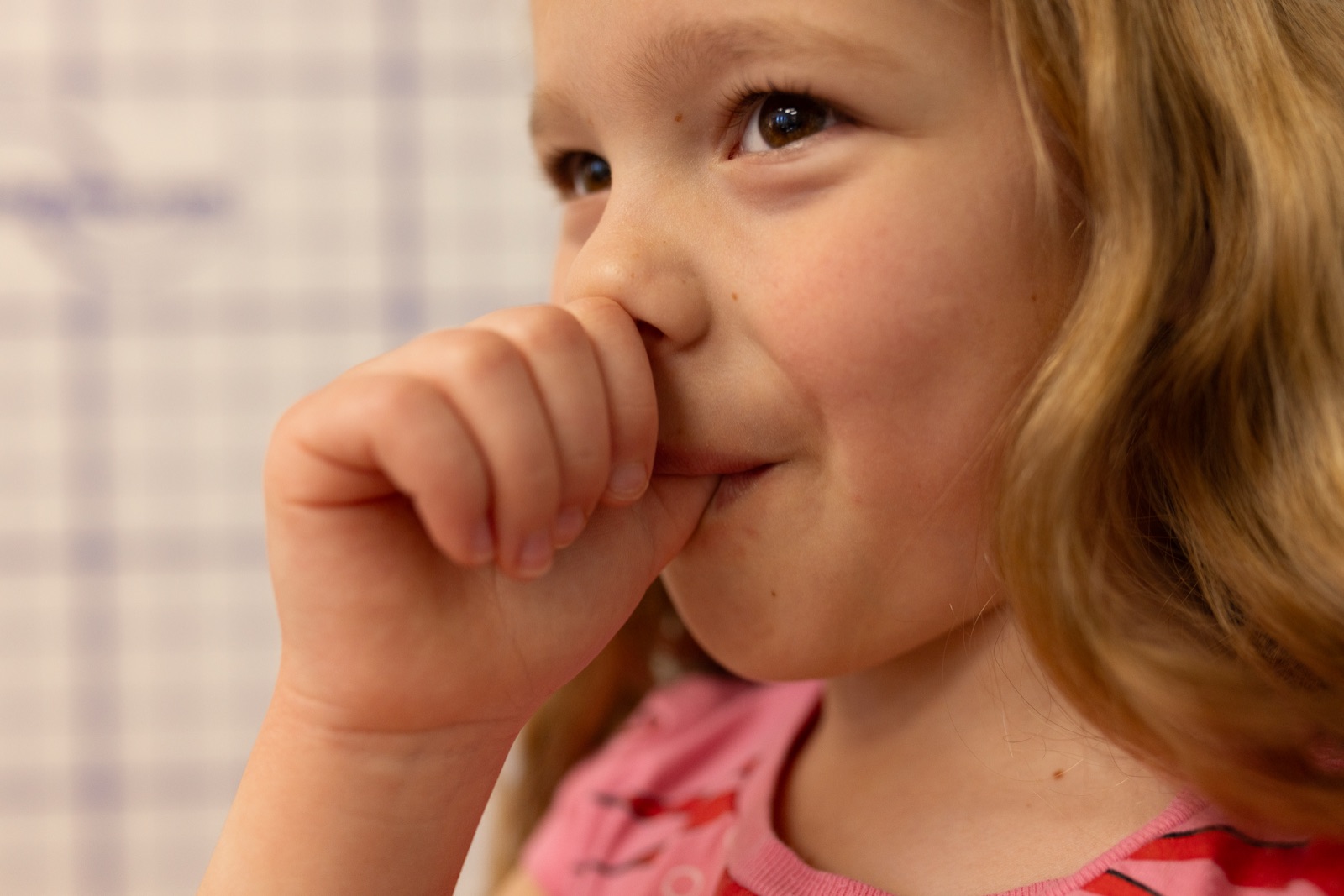 A child demonstrating a thumb-sucking habit